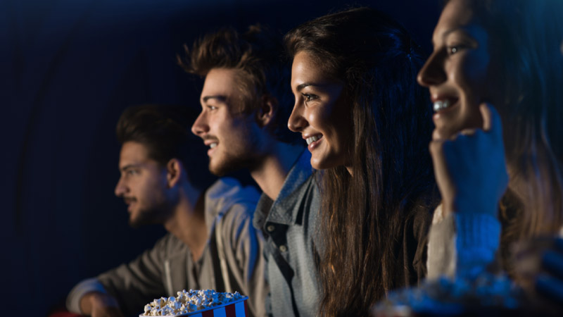 a group of people watching a movie