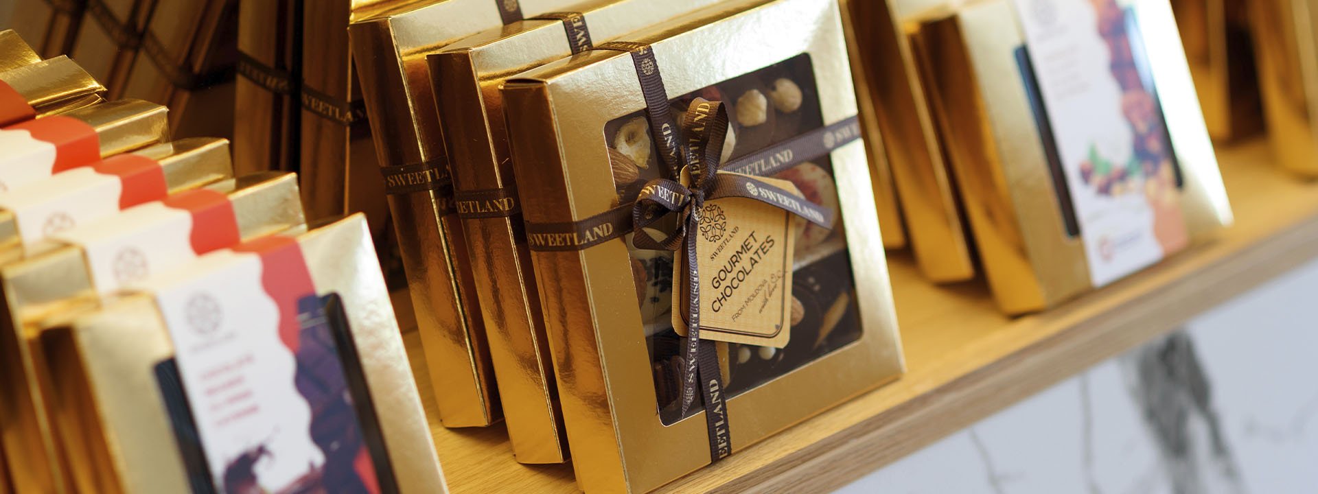 The author's packaged chocolate is put on the shelves