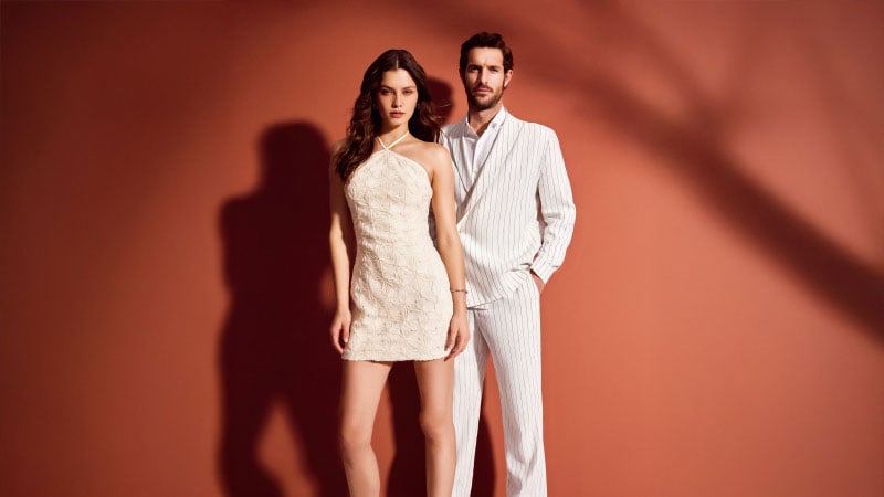 Two models pose for the camera